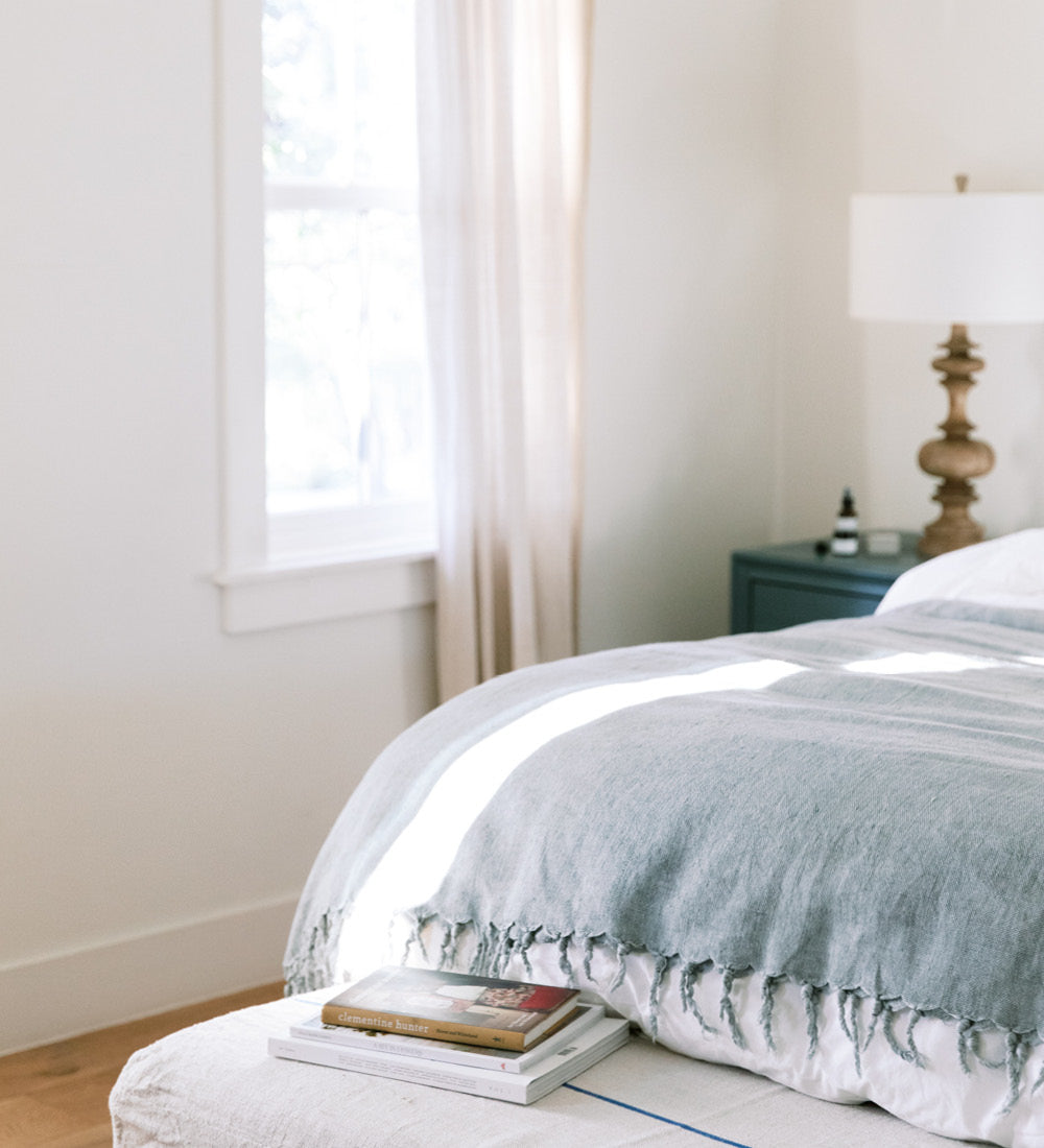A calm bedroom with beautiful natural light coming through the window